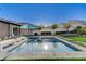 Relaxing pool area with a clean design and views of the mountain landscape at 10004 Terrastone Dr, Las Vegas, NV 89148