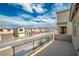 A balcony with an overlook of the neighborhood offering outdoor space for relaxation and enjoyment at 10189 Magnolia Creek St, Las Vegas, NV 89141