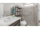 Modern bathroom with a glass-enclosed shower, vanity with sink, and contemporary fixtures at 10189 Magnolia Creek St, Las Vegas, NV 89141