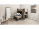 Bunk beds, a built-in desk, and a large mirror enhance this bedroom's functionality at 103 Reflection Cove Dr, Henderson, NV 89011