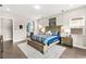 Spacious bedroom showcasing a king-size bed and ensuite bathroom, designed for comfort and style at 103 Reflection Cove Dr, Henderson, NV 89011