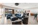 Open-concept living area showcasing modern furnishings, dining space, and stunning views at 103 Reflection Cove Dr, Henderson, NV 89011