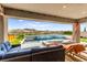 Inviting outdoor space with a pool, spa, and seating area, perfect for entertaining and enjoying the views at 103 Reflection Cove Dr, Henderson, NV 89011