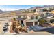 Attractive two-story home boasts mountain views and a well-manicured front yard in a pleasant community at 10611 Auburn Springs Ave, Las Vegas, NV 89166