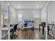 Bright home office with hardwood floors, two windows, and multiple computer workstations at 10611 Auburn Springs Ave, Las Vegas, NV 89166