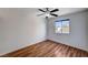 This bedroom features wood flooring, natural light, and white paint at 11117 Romola St, Las Vegas, NV 89141