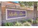The Bella Terra community name sign is mounted on a stone wall at 11117 Romola St, Las Vegas, NV 89141
