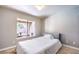 Cozy bedroom featuring neutral walls and ample natural light at 1112 Caraway Ln, Las Vegas, NV 89144