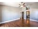 Spacious main bedroom featuring hardwood floors, and an ensuite bathroom with dual sinks and soaking tub at 1112 Caraway Ln, Las Vegas, NV 89144