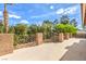 Spacious outdoor patio area with stylish railings and lush landscaping provides a relaxing atmosphere at 1112 Caraway Ln, Las Vegas, NV 89144