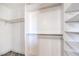 Bright walk-in closet with built-in shelving and ample storage space for organizing belongings at 1112 Caraway Ln, Las Vegas, NV 89144