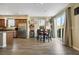 Open dining area featuring a seamless connection to the modern kitchen and an abundance of natural light at 1265 Inward Hill St, Henderson, NV 89002