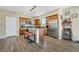 Well-lit kitchen with granite countertops, stainless steel appliances, and central island with bar seating at 1265 Inward Hill St, Henderson, NV 89002