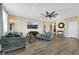 Spacious living room featuring hardwood floors, recessed lighting, and a ceiling fan at 1265 Inward Hill St, Henderson, NV 89002