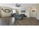Hardwood floored Living room with recessed lighting, ceiling fan, and modern decor at 1265 Inward Hill St, Henderson, NV 89002