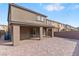 Spacious covered patio featuring brick pavers and access to backyard at 127 Medianoche St, Las Vegas, NV 89138