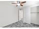 Bedroom featuring a ceiling fan and closet with sliding doors at 127 Medianoche St, Las Vegas, NV 89138