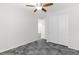 Bedroom featuring a ceiling fan and closet with sliding doors at 127 Medianoche St, Las Vegas, NV 89138