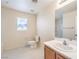 Bright bathroom featuring a single sink vanity, tile floors, and a combined bathtub and shower at 137 Desert Pond Ave, Henderson, NV 89002