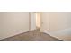 Vacant bedroom featuring plush carpeting, an open door, and two large closets, perfect for storage at 137 Desert Pond Ave, Henderson, NV 89002