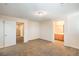 Large bedroom with plush carpeting offering views of ensuite bath at 137 Desert Pond Ave, Henderson, NV 89002