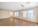 Bright living area featuring tile floors, multiple windows, and contemporary pendant lighting at 137 Desert Pond Ave, Henderson, NV 89002