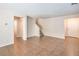 Bright and airy living room with neutral walls, tile flooring, and staircase at 137 Desert Pond Ave, Henderson, NV 89002