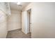 The walk-in closet offers ample storage with built in shelving and neutral carpeting at 137 Desert Pond Ave, Henderson, NV 89002