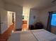 Bedroom with access to hardwood floors and a bathroom at 141 Gryffin Ave, Las Vegas, NV 89123