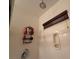 Shower stall includes convenient storage rack and window for natural lighting at 141 Gryffin Ave, Las Vegas, NV 89123