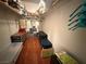 Spacious walk-in closet with custom shelving and wood flooring at 141 Gryffin Ave, Las Vegas, NV 89123