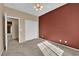 Bedroom showcasing neutral walls, plush carpet, and a ceiling fan at 1525 Spiced Wine Ave # 10102, Henderson, NV 89074