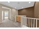 Bright hallway features neutral walls, carpeting and a built-in storage cabinet at 1525 Spiced Wine Ave # 10102, Henderson, NV 89074