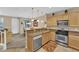 Kitchen area with a breakfast nook, stainless steel appliances, and view of the living room at 1525 Spiced Wine Ave # 10102, Henderson, NV 89074