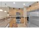 Shows the kitchen area featuring stainless steel appliances and granite countertops at 1525 Spiced Wine Ave # 10102, Henderson, NV 89074