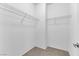 Bright walk-in closet featuring wire shelving and neutral carpeting at 1525 Spiced Wine Ave # 10102, Henderson, NV 89074