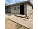 A well-lit entrance features a concrete walkway and traditional architecture at 1651 Cadillac Ln, Las Vegas, NV 89106