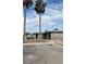 The building's exterior is enhanced by lush palm trees, providing shade at 1651 Cadillac Ln, Las Vegas, NV 89106