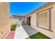 Enclosed back patio with concrete flooring, artificial turf, and space for outdoor seating at 173 Calm Morning Ave, Henderson, NV 89002