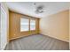 Comfortable bedroom featuring a ceiling fan, neutral walls, and two windows bringing in natural light at 173 Calm Morning Ave, Henderson, NV 89002