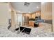 Kitchen featuring granite countertops, stainless steel appliances, and a double sink at 173 Calm Morning Ave, Henderson, NV 89002