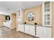 Living area featuring tile flooring, built-in storage with granite countertops, and modern accents at 173 Calm Morning Ave, Henderson, NV 89002