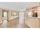 Open living area with granite countertops, built-in storage, and modern stainless steel kitchen appliances at 173 Calm Morning Ave, Henderson, NV 89002