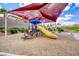 Community playground with vibrant play structure and shade at 173 Calm Morning Ave, Henderson, NV 89002