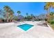 Community pool area with palm trees, chaise lounges, and relaxing ambiance at 173 Calm Morning Ave, Henderson, NV 89002