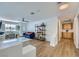 Open living room with a desk, bright window, and stylish decor at 176 Tierra Bonita Ct, Henderson, NV 89074