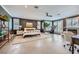 Spacious main bedroom with shutters, a fireplace, a ceiling fan, and an exercise machine at 176 Tierra Bonita Ct, Henderson, NV 89074