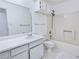 Bathroom featuring a vanity, toilet, and shower-tub combo with shower head at 2044 Mesquite Ln # 202, Laughlin, NV 89029