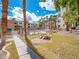 Scenic community area featuring picnic tables and lush greenery, creating a peaceful outdoor retreat at 2044 Mesquite Ln # 202, Laughlin, NV 89029