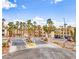 Welcoming entrance to Portofino Condominiums, lined with palm trees for a touch of tropical elegance at 2044 Mesquite Ln # 202, Laughlin, NV 89029
